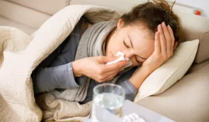 sick woman needing flu treatment in St. George